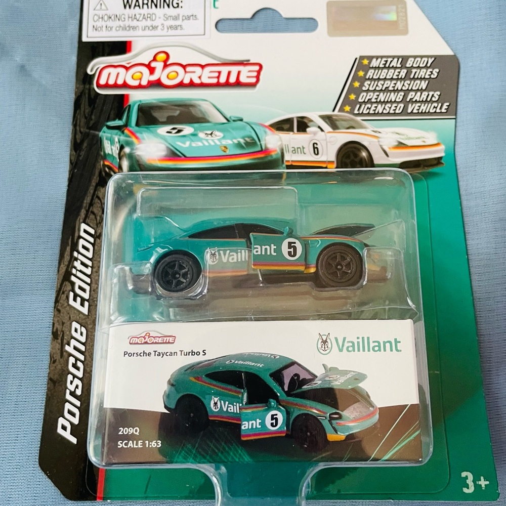 COPY - NEW IN PACKAGING- Majorette Porsche Taycan Turbo S